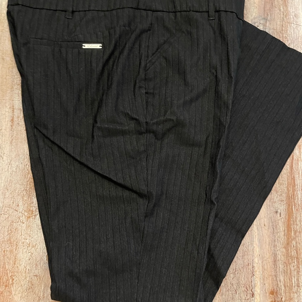 Black pinstriped dress pants by Rekucci